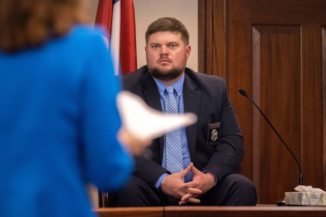 Glynn County Police Department Investigative Detective Parker Marcy sits on the witness stand in the Glynn County Courthouse on Tuesday.