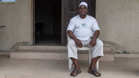 Chief Elegushi Atewolara Yusuf sits in front of his palace on Lagos Island.
