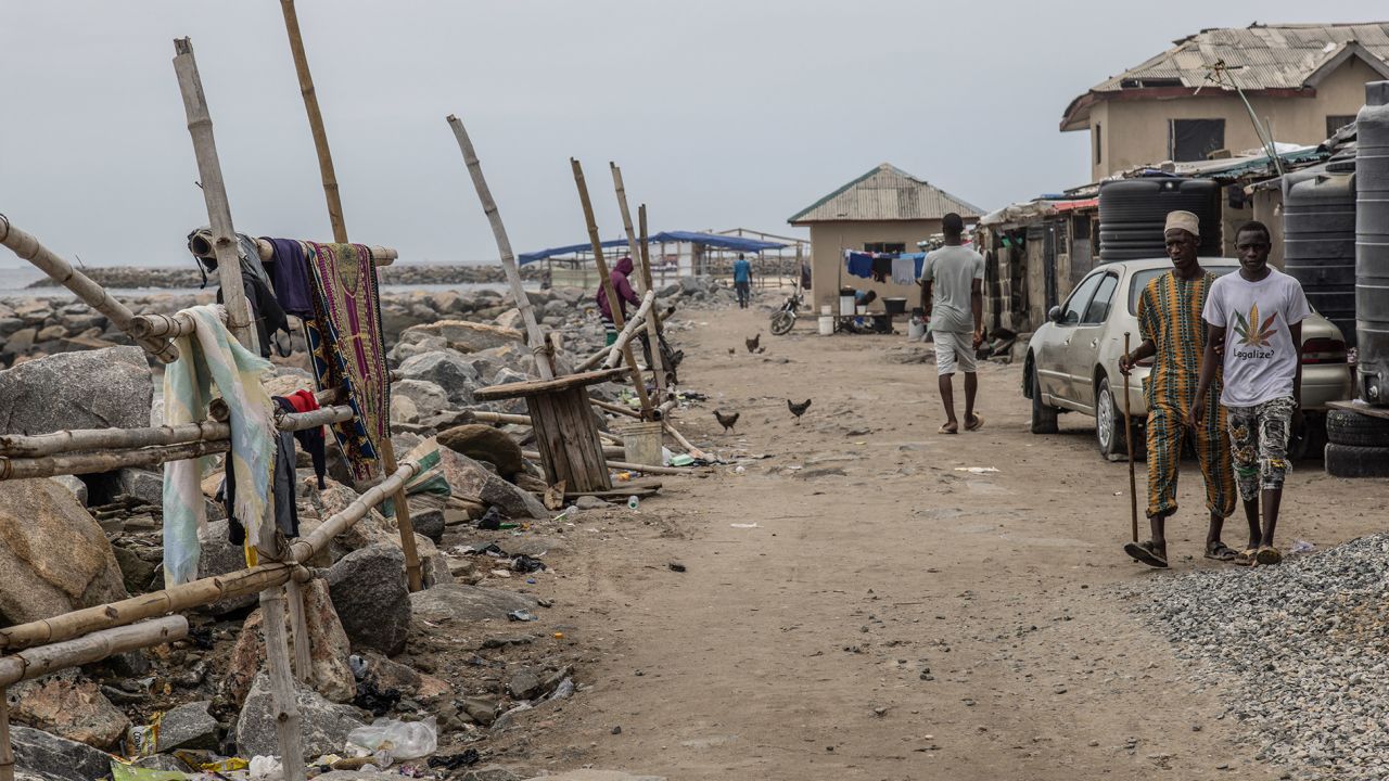 Remnants of streets and roads remain along the edge of the Okun Alfa community.