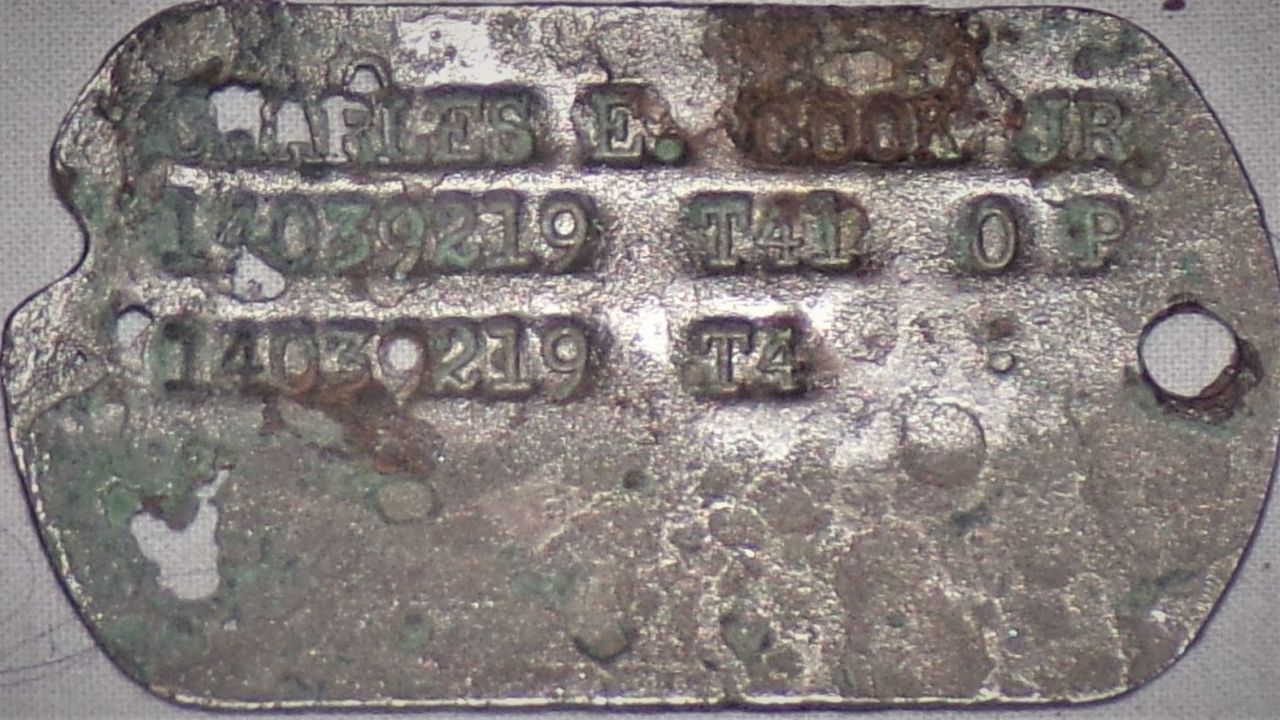 Pvt. Pete Cook's dog tag