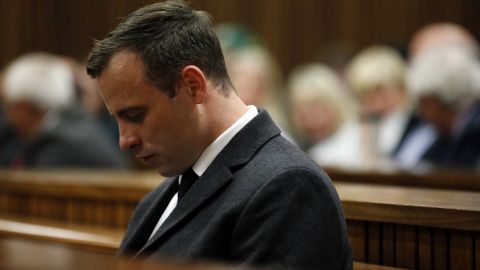PRETORIA, SOUTH AFRICA - JULY 6: Paralympian athlete Oscar Pistorius (L), accused of the murder of his girlfriend Reeva Steenkamp, looks on during a hearing in his murder trial on July 6, 2016 at the High Court in Pretoria, South Africa. (Photo by Marco Longari - Pool/Getty Images)