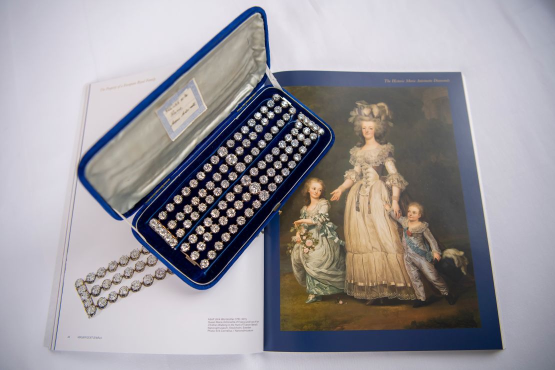 Each bracelet features three rows of diamonds.