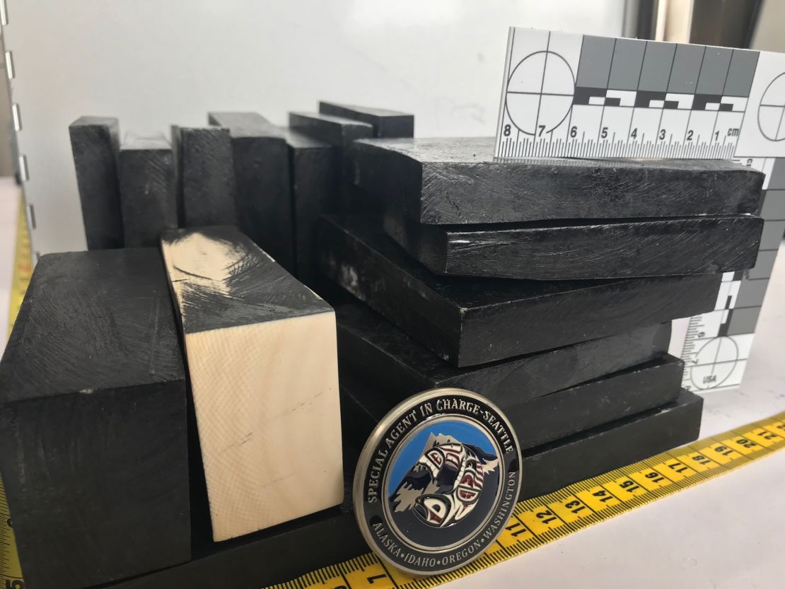 The ivory was disguised as ebony wood in an effort to sneak it into the US, authorities say.