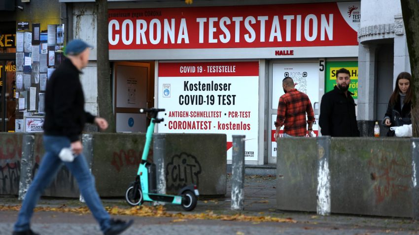 BERLIN, GERMANY - NOVEMBER 09: People walk past a Covid-19 testing station on November 09, 2021 in Berlin, Germany. Infections rates for the novel coronavirus have skyrocketed across Germany over the past week to record highs. So far approximately 67% of people in Germany are fully vaccinated against Covid-19 and of those currently being admitted to hospital for the disease 90% are unvaccinated. (Photo by Adam Berry/Getty Images)