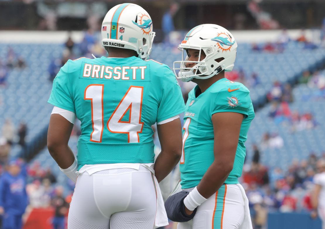 Brissett and Tagovailoa meet before the game against the Buffalo Bills in October.