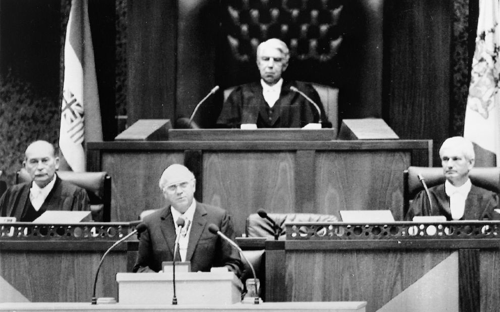 De Klerk announces the scrapping of remaining apartheid laws in parliament on February 1, 1991, in Cape Town.