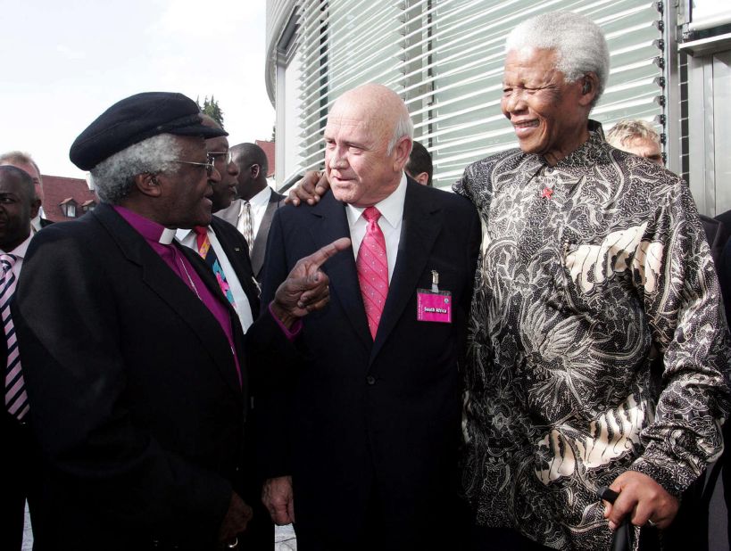 Archibishop Desmond Tutu, de Klerk and Mandela confer on May 14, 2004, in Zurich, Switzerland, after a meeting of the FIFA executive committee for the presentation of the five African nations bidding to host the 2010 World Cup. South Africa was later selected to host the competition.