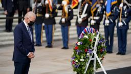 President Joe Biden pauses during a wreath laying ceremony to commemorate Veterans Day and mark the centennial anniversary of the Tomb of the Unknown Soldier at Arlington National Cemetery, Thursday, Nov. 11, 2021, in Arlington, Va.
