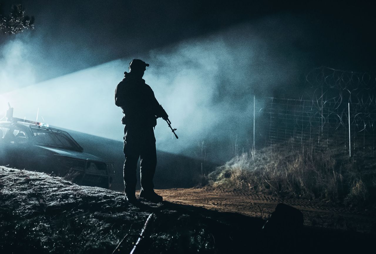 A soldier from the Polish Armed Forces patrols the border crossing on Tuesday, November 9.