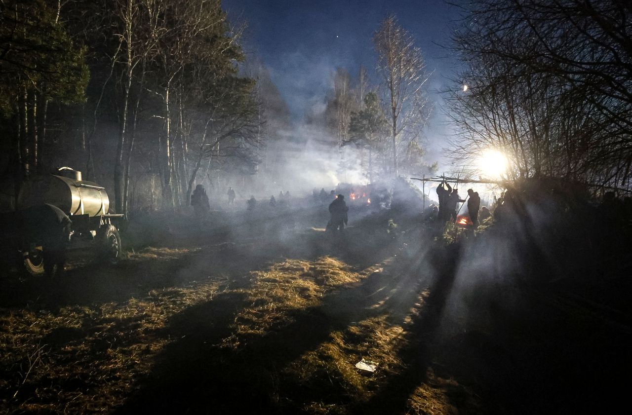 Migrants stay at a tent camp near Grodno on Wednesday, November 10.