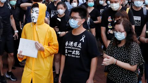 Hong Kong activist dubbed "Captain America 2.0" Ma Chun-man (center) attends a vigil on June 15, 2020 for a protester who fell to his death during a demonstration.