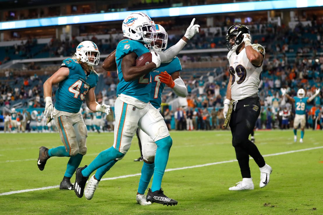 Justin Coleman celebrates with teammates after intercepting a pass from Jackson. 