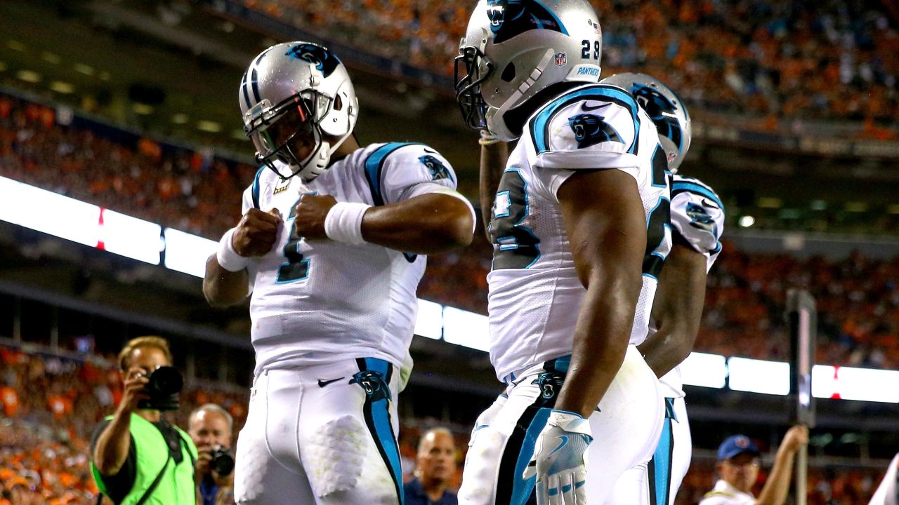 Newton celebrates after scoring on a two-yard rushing touchdown against the Denver Broncos on September 8, 2016.