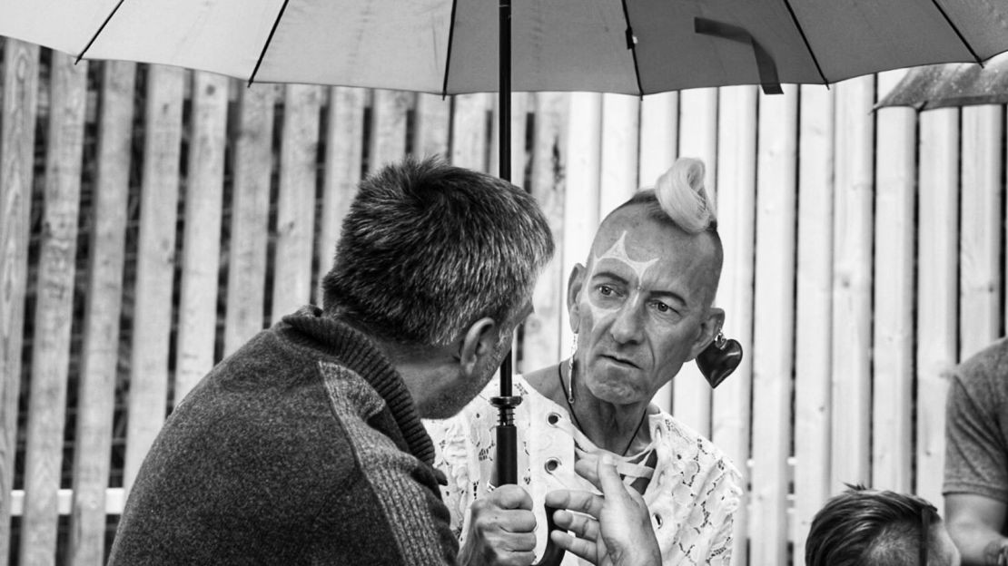 A Human Library volunteer, right, discusses his life as a gay man at a recent gathering.