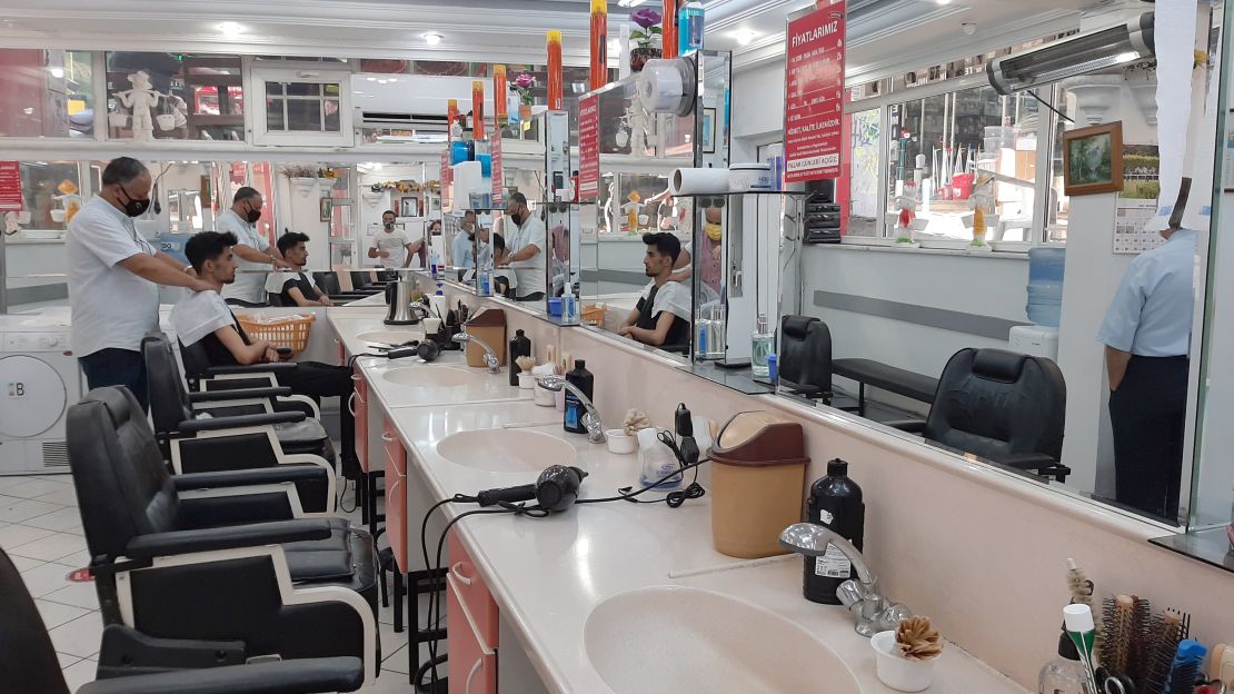 Barbers can boost their customer's morale, says Nihat Aram.