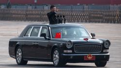 BEIJING, CHINA - OCTOBER 01: Chinese President Xi Jinping waves as he drives after inspecting the troops during a parade to celebrate the 70th Anniversary of the founding of the People's Republic of China at Tiananmen Square in 1949, on October 1, 2019 in Beijing, China. (Photo by Kevin Frayer/Getty Images)