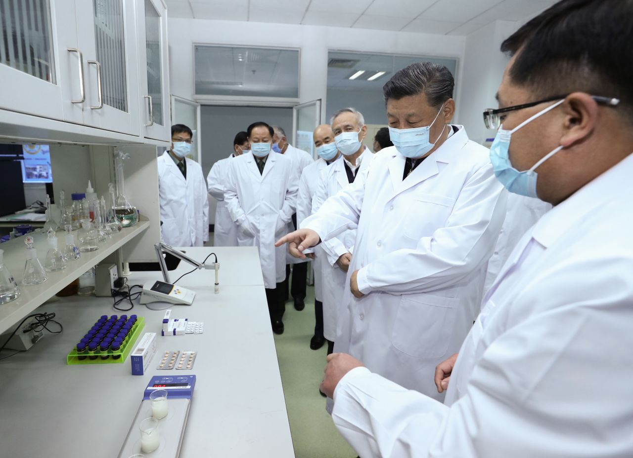 Xi learns about progress on a coronavirus vaccine and antibody treatment during a visit to the Academy of Military Medical Sciences in Beijing in March 2020.