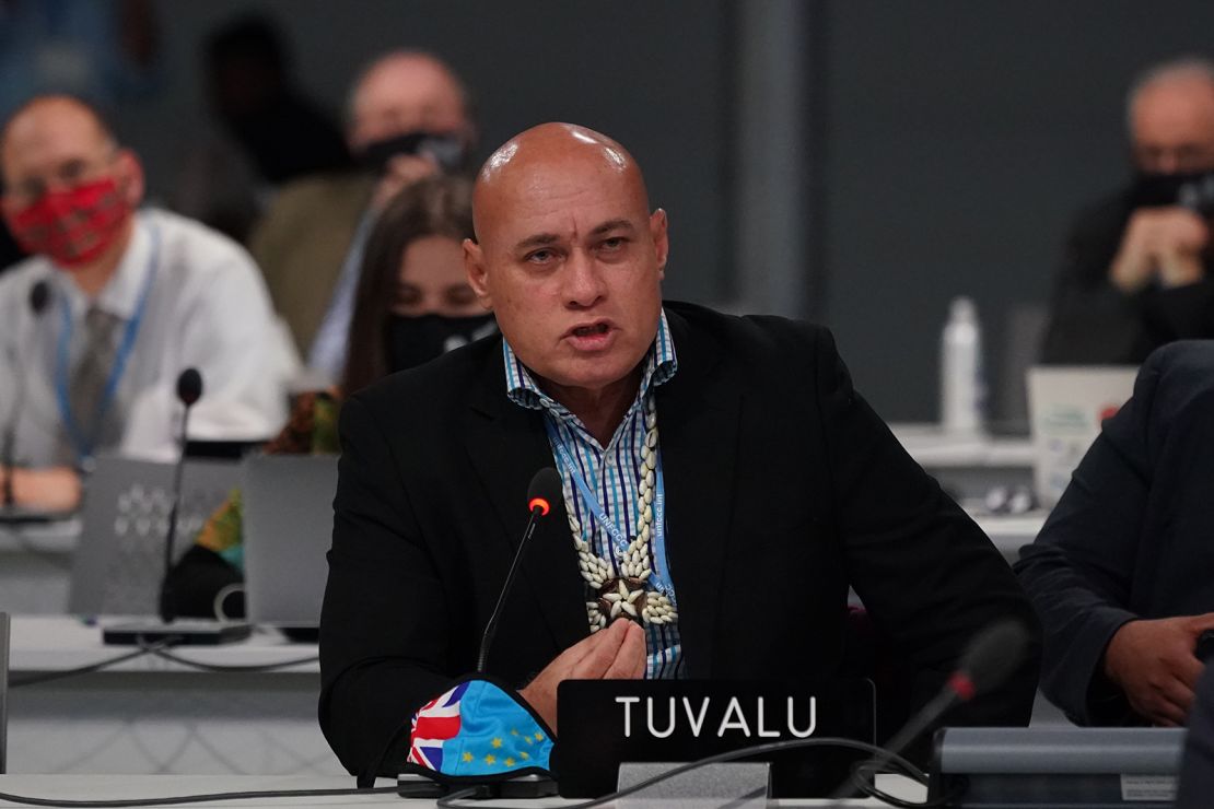 Seve Paeniu, Tuvalu's climate envoy, intervenes during the session on Saturday to give feedback on a draft agreement. 