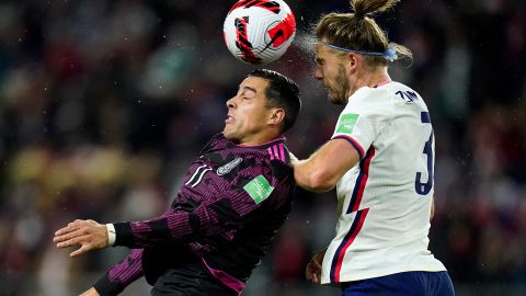 Mexico's Rogelio Funes Mori challenges for the ball against Walker Zimmerman.