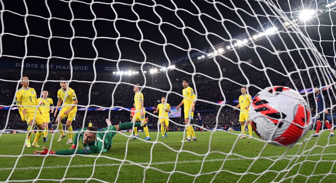 Kazakhstan's goalkeeper Stas Pokatilov concedes a goal against France.