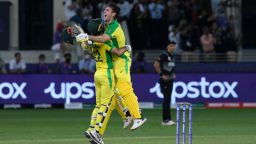 Australia's Glenn Maxwell (L) and Mitchell Marsh celebrate their win in the ICC mens Twenty20 World Cup final match between Australia and New Zealand at the Dubai International Cricket Stadium in Dubai on November 14, 2021. (Photo by Aamir QURESHI / AFP) (Photo by AAMIR QURESHI/AFP via Getty Images)