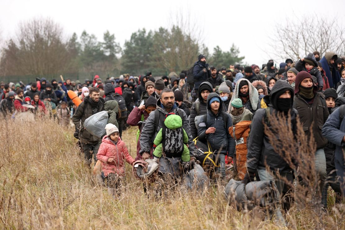 People gather near the Belarusian - Polish border crossing in Kuznica on November 15, 2021.