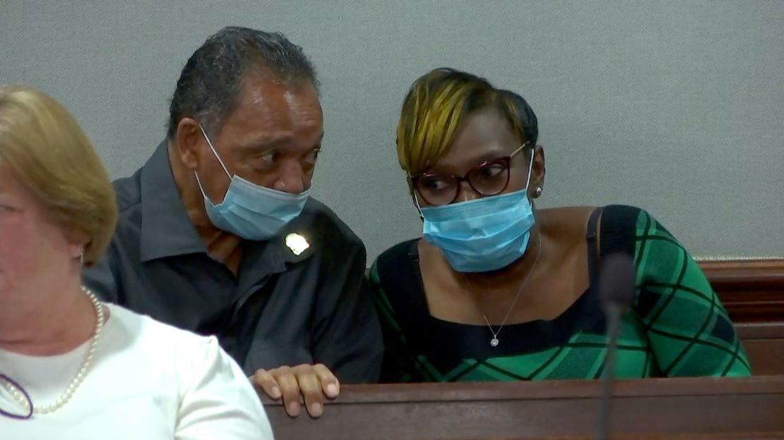 The Rev. Jesse Jackson sits inside the courtroom on Monday with Ahmaud Arbery's mother, Wanda Cooper-Jones.