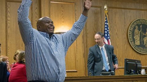 Dontae Sharpe enters a Pitt County courtroom to the cheers of his family after a judge determined he could be set free on a $100,000 unsecured bond on August 22, 2019, in Greenville, North Carolina.