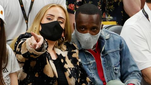 Adele (left) looks on next to Rich Paul (right) during Game Five of the NBA Finals, between the Milwaukee Bucks and the Phoenix Suns, at Footprint Center in Phoenix, July 17. 
