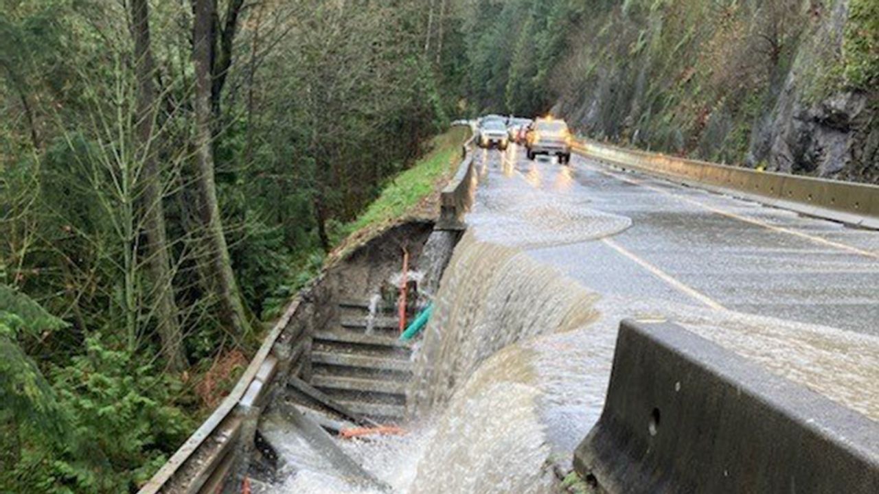 Relentless rain continued to batter Canada's Pacific coast on Monday, with water covering roads like the Malahat Highway on Vancouver Island.