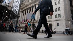Pedestrians pass in front of the New York Stock Exchange (NYSE) in New York, U.S., on Monday, Sept. 20, 2021. 