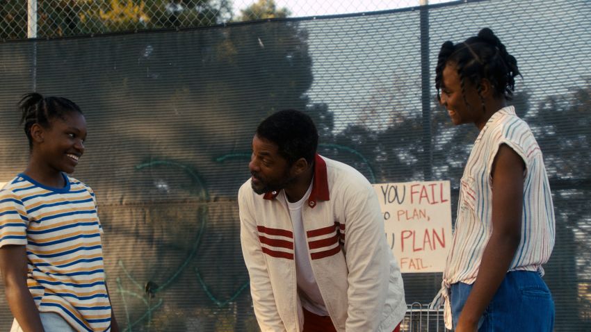 Caption: (L-r) DEMI SINGLETON as Serena Williams, WILL SMITH as Richard Williams and SANIYYA SIDNEY as Venus Williams in Warner Bros. Pictures' inspiring drama "KING RICHARD," a Warner Bros. Pictures release.