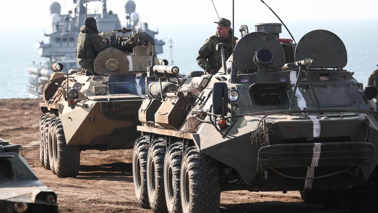 Armored personnel carriers take part in an amphibious landing exercise held by army corps and naval infantry units of the Russian Black Sea Fleet at the Opuk range in Crimea in October 2021. 