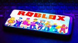 The Roblox logo seen displayed on a smartphone.