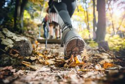 Hiking outdoors, surrounded by nature, boosts your outlook, according to studies.