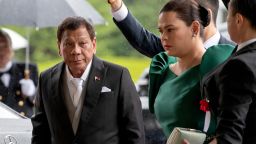 FILE PHOTO: Philippines President Rodrigo Duterte arrives with daughter Sara Duterte-Carpio to attend the enthronement ceremony of Japan's Emperor Naruhito in Tokyo, Japan October 22, 2019.  Carl Court/Pool via REUTERS/File Photo