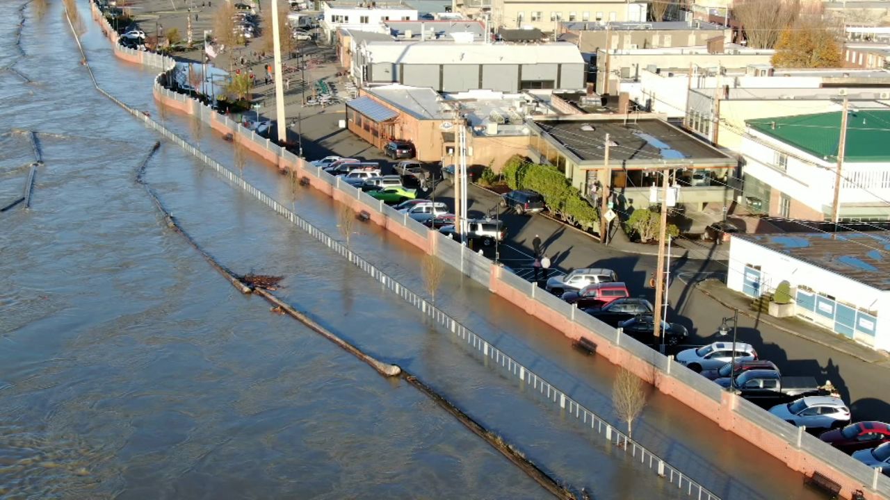 A floodwall keeps water out of downtown Mount Vernon.