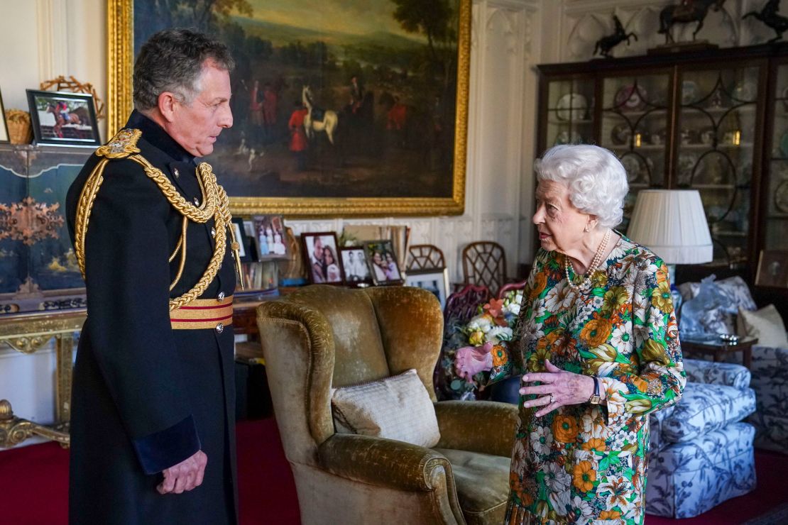 Queen Elizabeth II receives General Nick Carter, Chief of the Defense Staff, left, during an audience in the Oak Room at Windsor Castle on November 17, 2021.