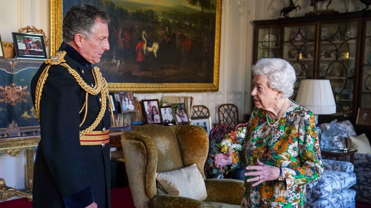 Queen Elizabeth II receives General Nick Carter, Chief of the Defense Staff, left, during an audience in the Oak Room at Windsor Castle on November 17, 2021.