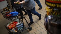 A shopper pushes a cart filled with candy at Hershey's Chocolate World in Hershey, Pennsylvania, U.S., on Thursday, Nov. 11, 2021. 