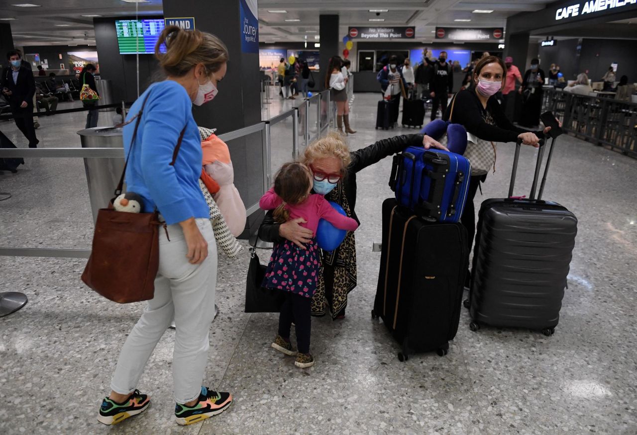 Families reunited at Dulles International Airport on November 8, 2021, when the US reopened to vaccinated international travelers. 