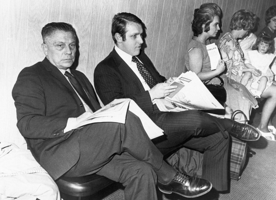 Jimmy Hoffa, left, in the waiting area at Pittsburgh Airport in this  1971 file photo, with his son James Hoffa seated next to him. Jimmy Hoffa was enroute to the federal prison at Lewisburg, Pennsylvania when the photo was taken. 