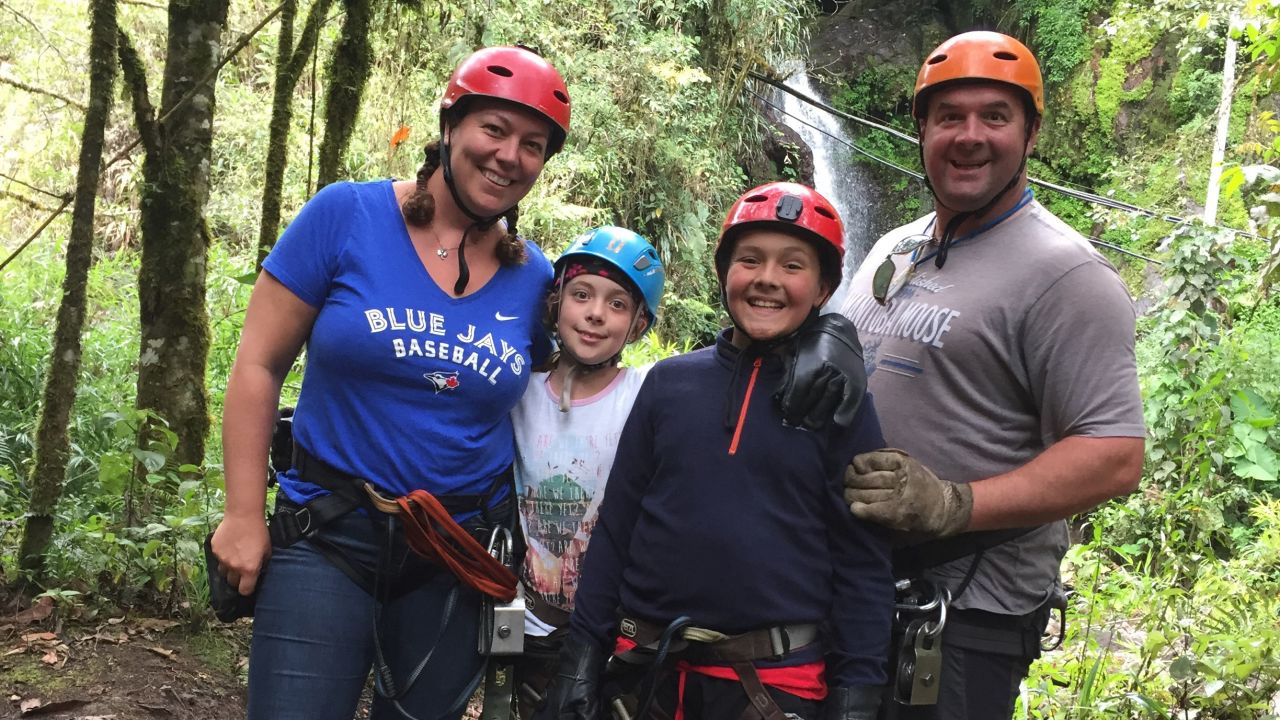 <strong>Family adventures:</strong> The couple have two children, Spencer and Lauren. In 2016, the family embarked on a global travel adventure for nine months. Here they are ziplining in Equador. 
