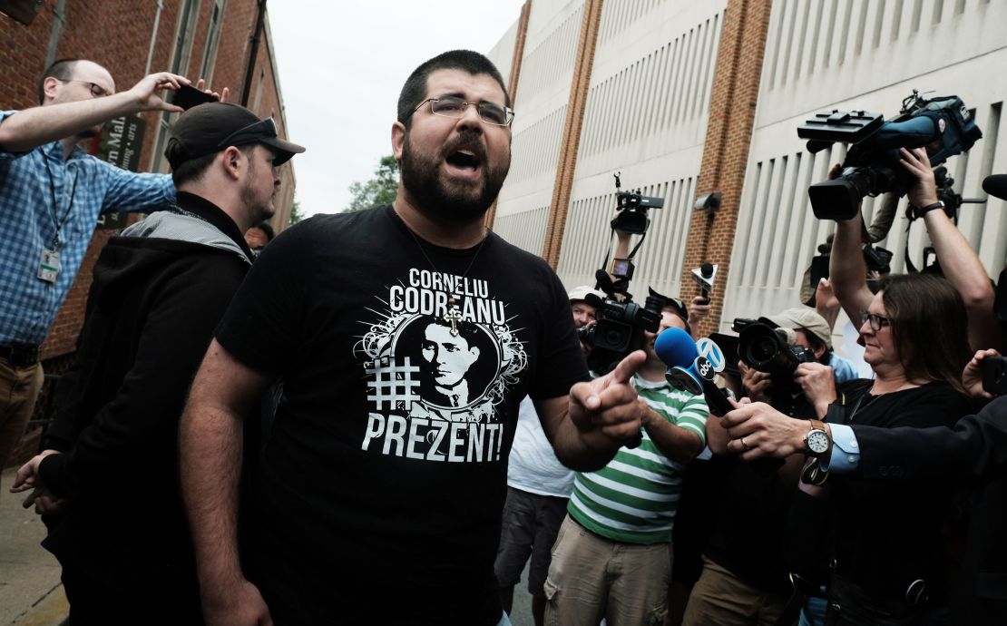White nationalist leader Matthew Heimbach screams at reporters  in defense of James Alex Fields on August 14, 2017, outside Charlottesville General Courthouse.