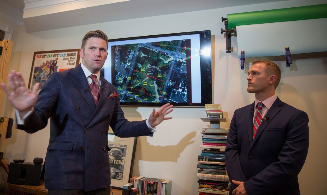 Spencer, left, and Nathan Damigo of Identity Evropa speak to reporters on August 14, 2017, in Alexandria, Virginia.