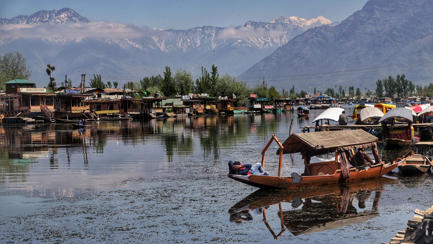 Shikara owners wait for customers on the world-famous Dal Lake in Srinagar on April 24, 2021. 