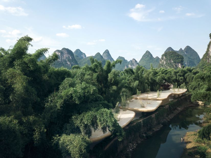 Along the banks of the Li River in Yangshuo, China, woven bamboo canopies and pavilions are framed against the scenery of Guilin. The area was already covered in bamboo groves, so Shanghai-based architecture studio LLLab opted to use bamboo to integrate the paviilion into its surroundings.