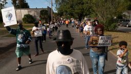 Protesters are seen during a march from the Glynn County Courthouse to the Brunswick African American Cultural Center in support of Ahmaud Arbery on Thursday, November 11, 2021, in Brunswick, Ga. Elijah Nouvelage for CNN