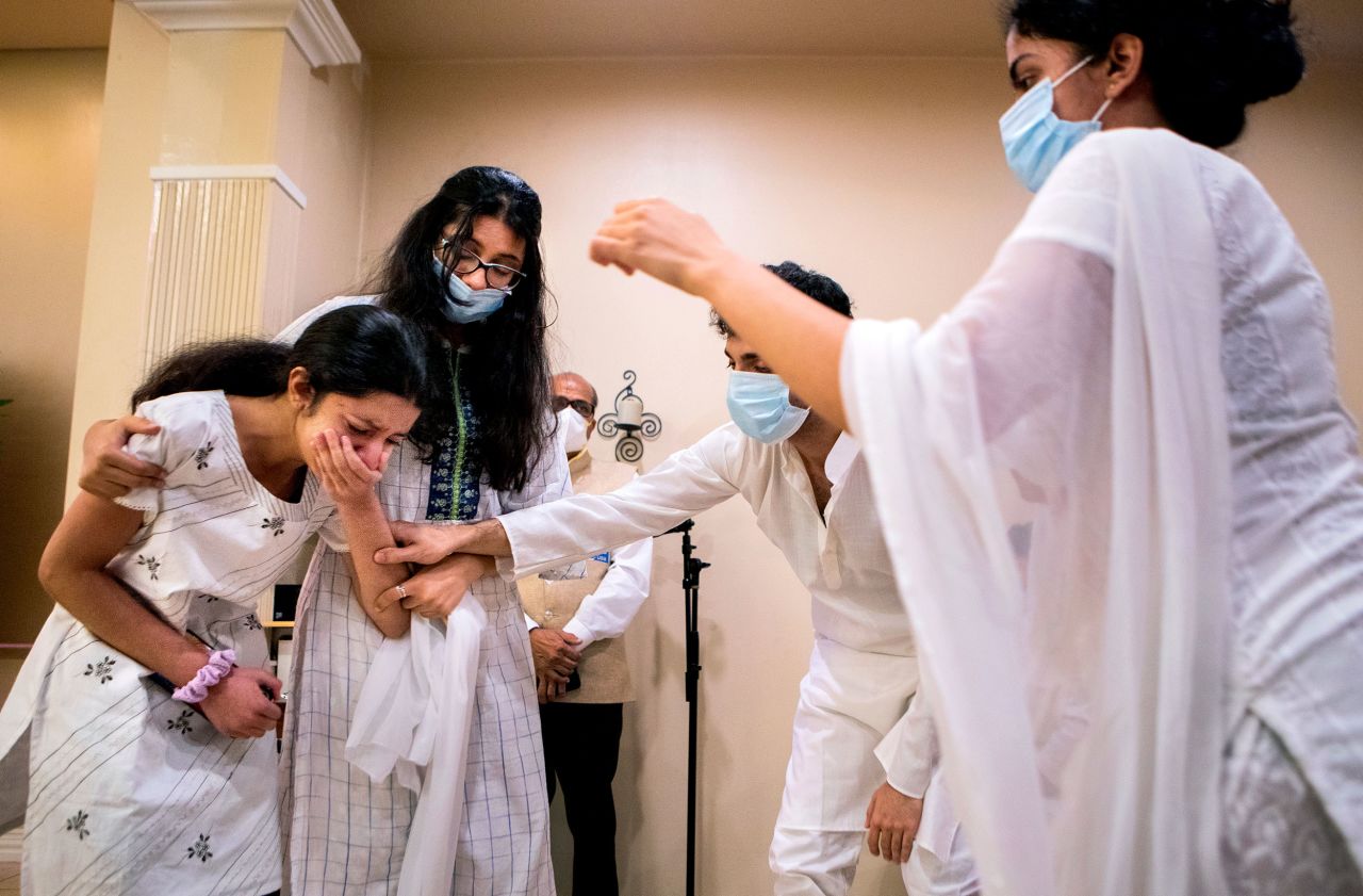 Ria Shahani is comforted by family members after speaking at the funeral of her sister Bharti on Tuesday, November 16. <a href="https://www.cnn.com/2021/11/11/us/travis-scott-concert-houston-thursday/index.html" target="_blank">Bharti Shahani,</a> a 22-year-old college student, was one of <a href="https://www.cnn.com/2021/11/07/us/victims-astroworld-houston/index.html" target="_blank">10 people who died</a> after a crowd surge at the Astroworld music festival in Houston earlier this month.