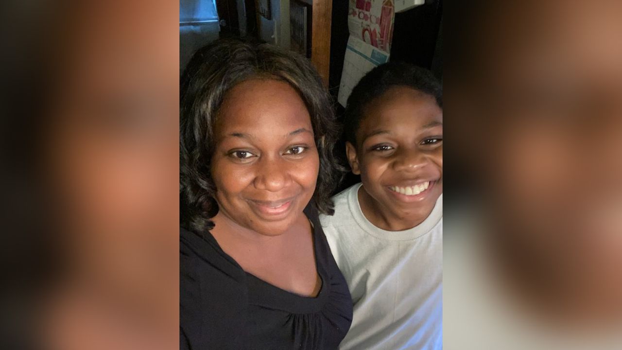 Abraham with his mom, Miriam Olagbegi.